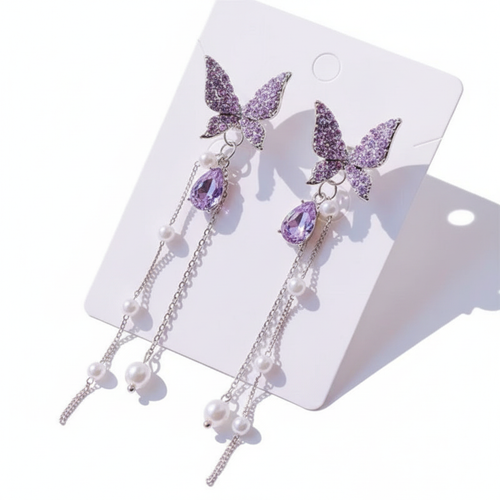 Aretes en tarjeta fondo blanco